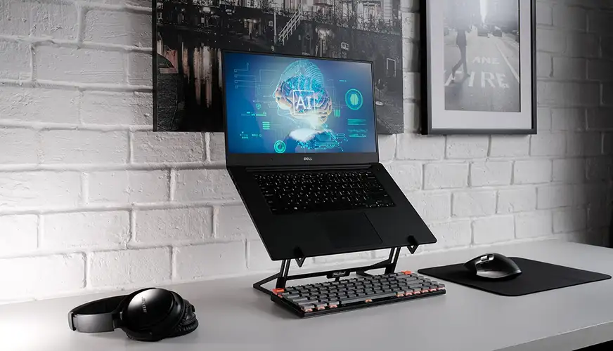 Laptop on a Base with Mouse and Headset